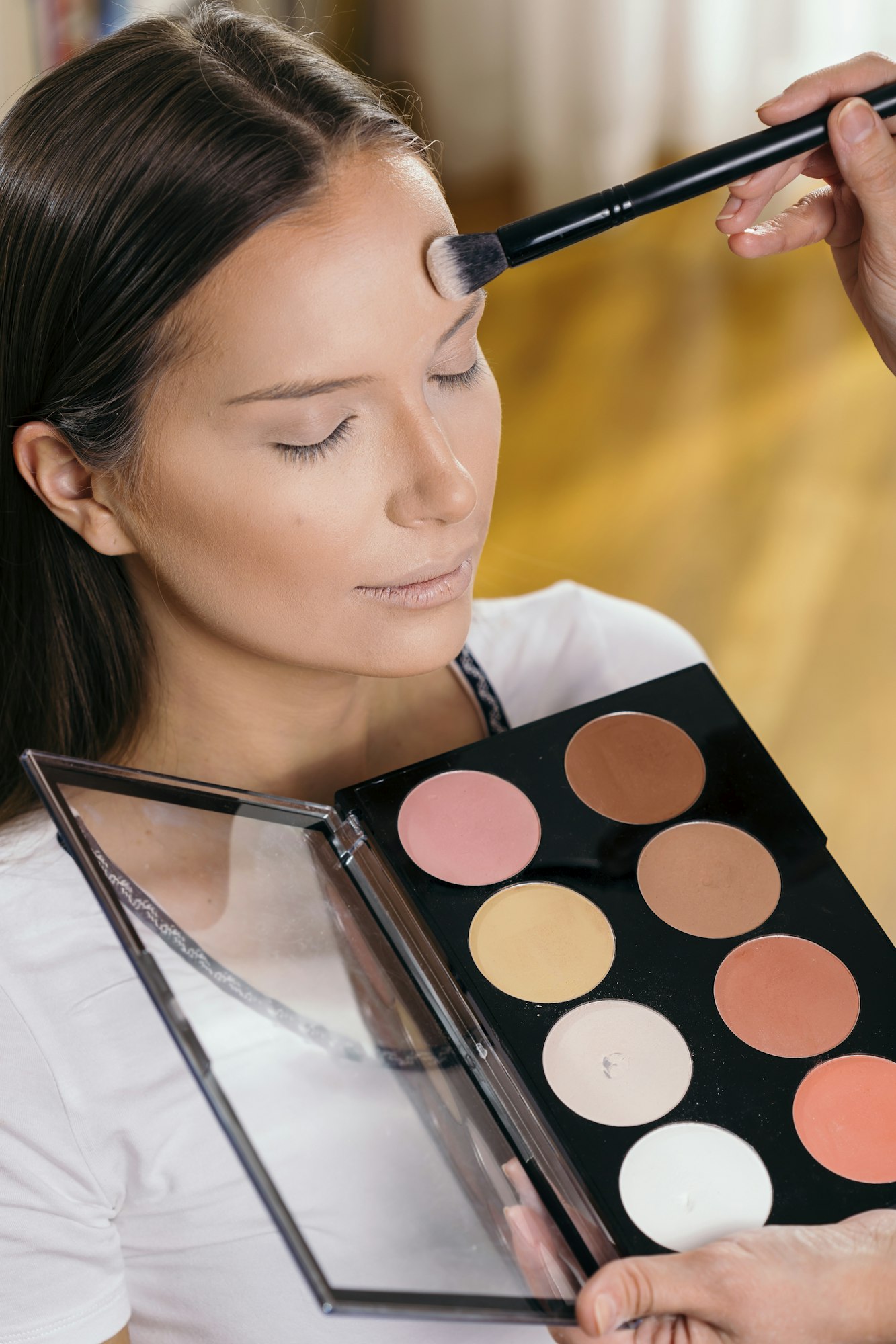 Make up artist working in a studio